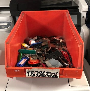 Red Box with Assortment of Keys