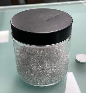 Clear Glass Tub of Push Pins