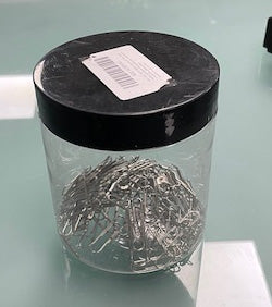 Clear Glass Tub of Paper Clips